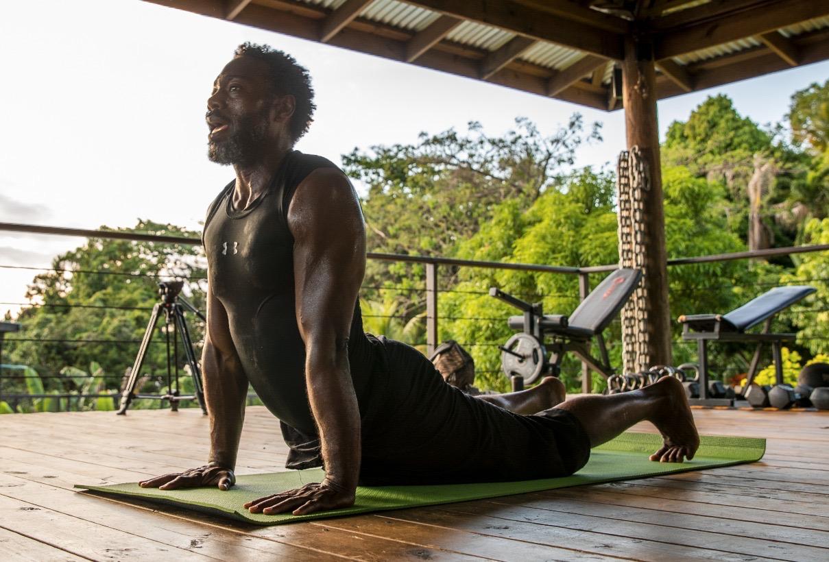 Eugene performing cobra yoga pose
