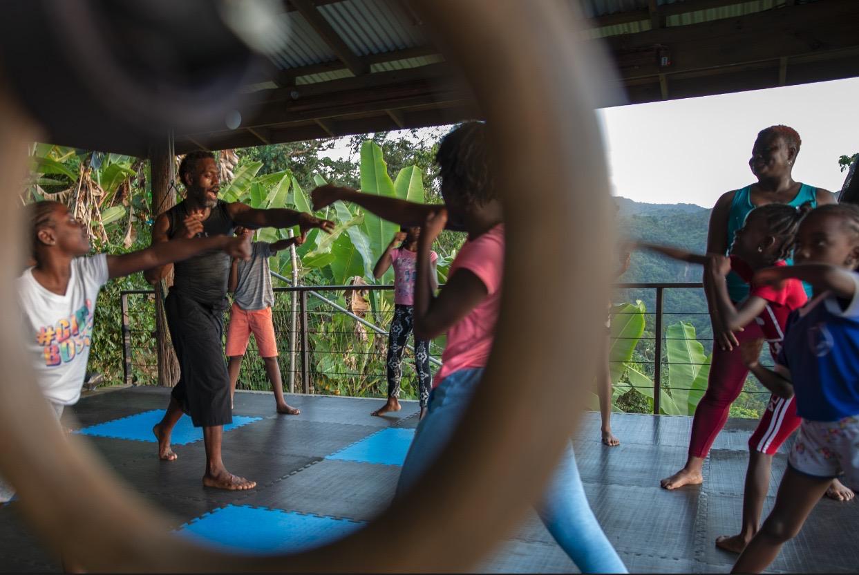 Training session framed through gymnastics rings